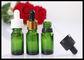 Wysokiej jakości 10 ml zielone szklane butelki z kroplomierzem do olejków eterycznych dostawca